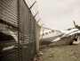 small plane crashes through fence in emergency landing, hard landing, crash landing