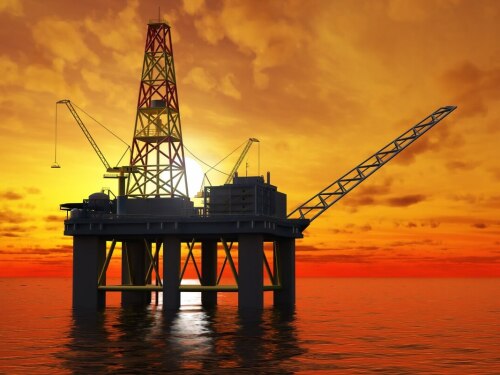 Oil Platform at Sea with Sunset
