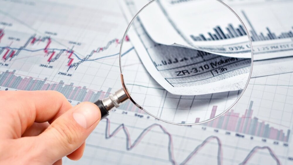Magnifying Glass Financial Report Turnaround Stock