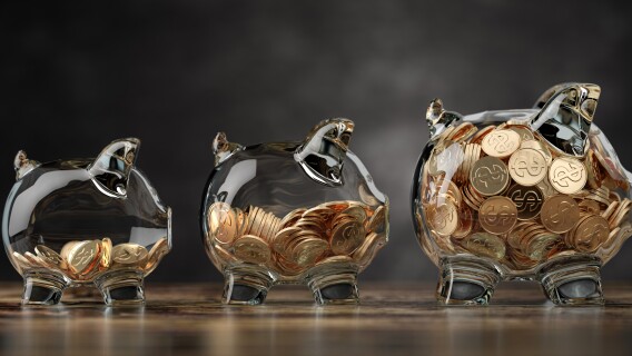 piggy banks growing in size representing different market capitalizations