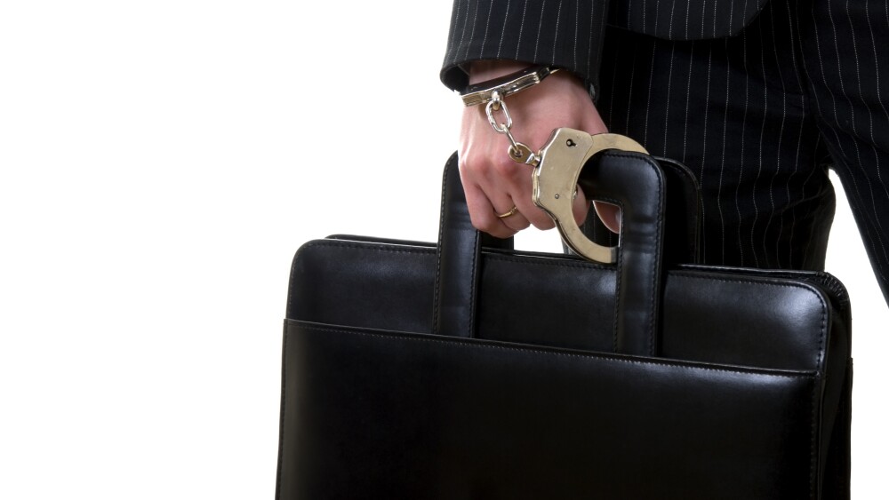 Secured Briefcase to protect documents with handcuffs akin to protecting profits with options
