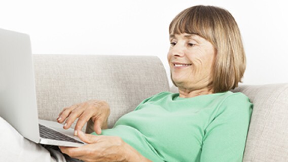 senior on couch finding health insurance without medicare