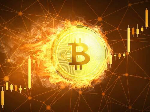 bitcoin-token-burning-in-front-of-cryptocurrency-stock-chart.jpg