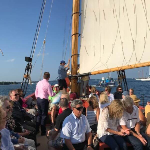 Cabot Wealth Summit patrons ride the Schooner Fame on a glorious August evening in Salem.