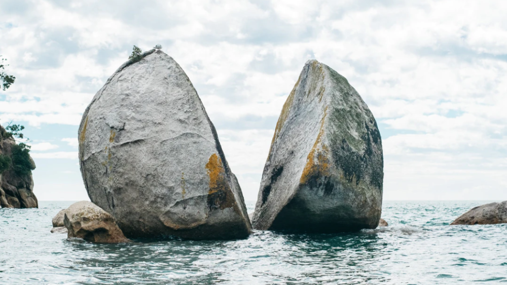 A rock split cleanly in two representing stock splits and reverse stock splits
