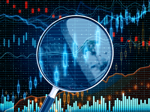 a-magnifying-glass-over-digital-small-cap-stock-charts.png