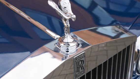 Rolls Royce (RYCEY) with famous winged emblem mascot, cars, company, stock