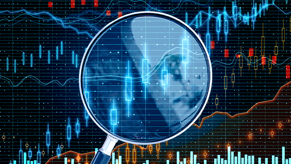 a-magnifying-glass-over-digital-small-cap-stock-charts.png
