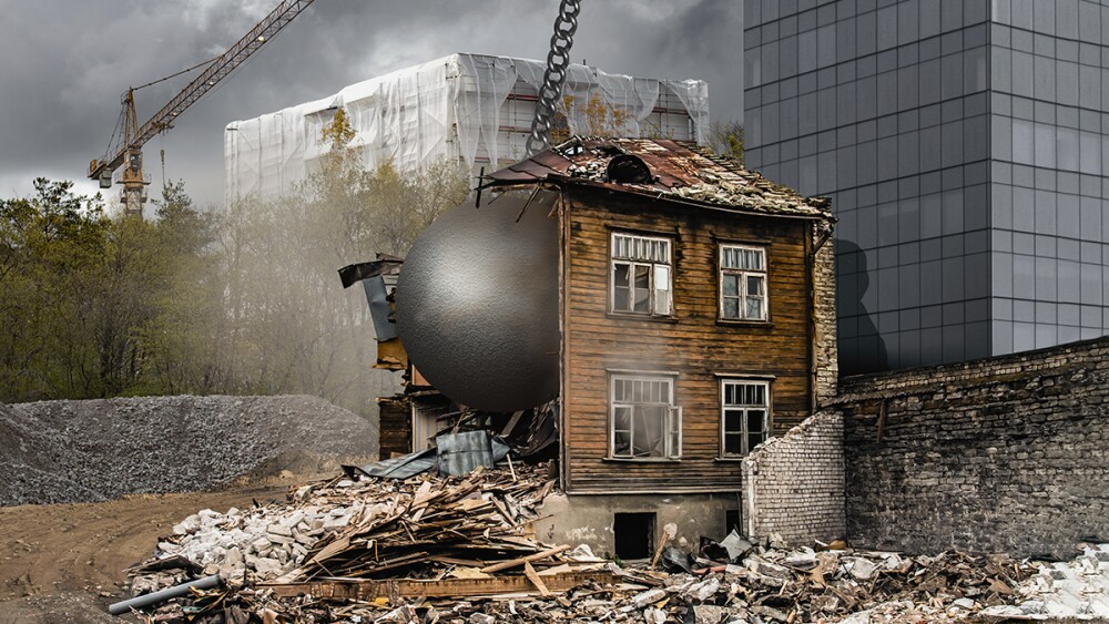 A Wrecking Ball Demolishing a House