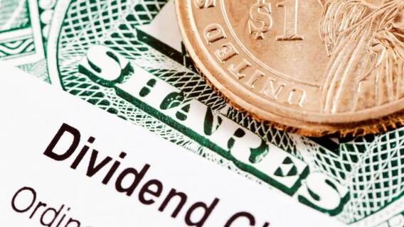 Dollar coin on dividend stock certificate, but are the dividends qualified?