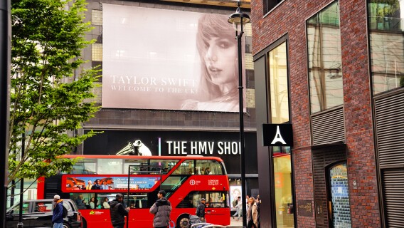 Europe's busiest shopping street: The iconic HMV music store featuring Taylor Swift at Oxford street in Central London, England United Kingdom Britain Europe, Daytime